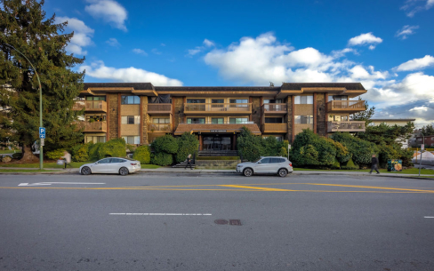 Picture of the building exterior of Harvard Apartments from St. Georges Avenue.